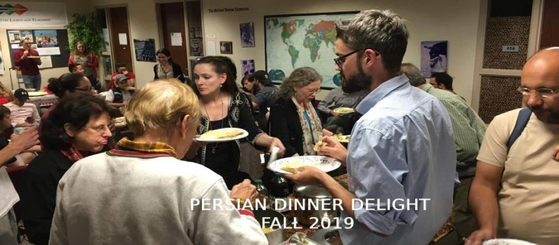 people enjoying Persian food at Persian Dinner Delight event